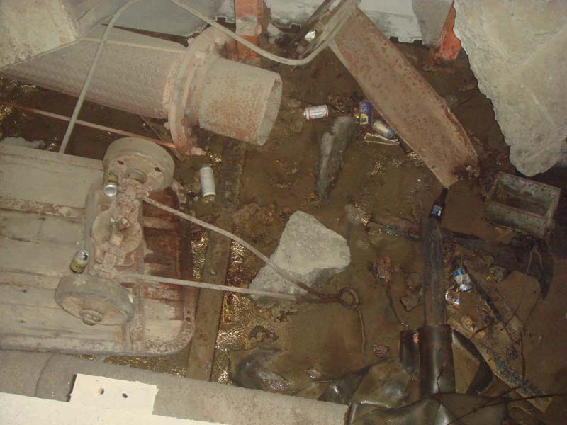 A trench full of junk - that pipe you see at the upper left is 16 inches in diameter by the way.