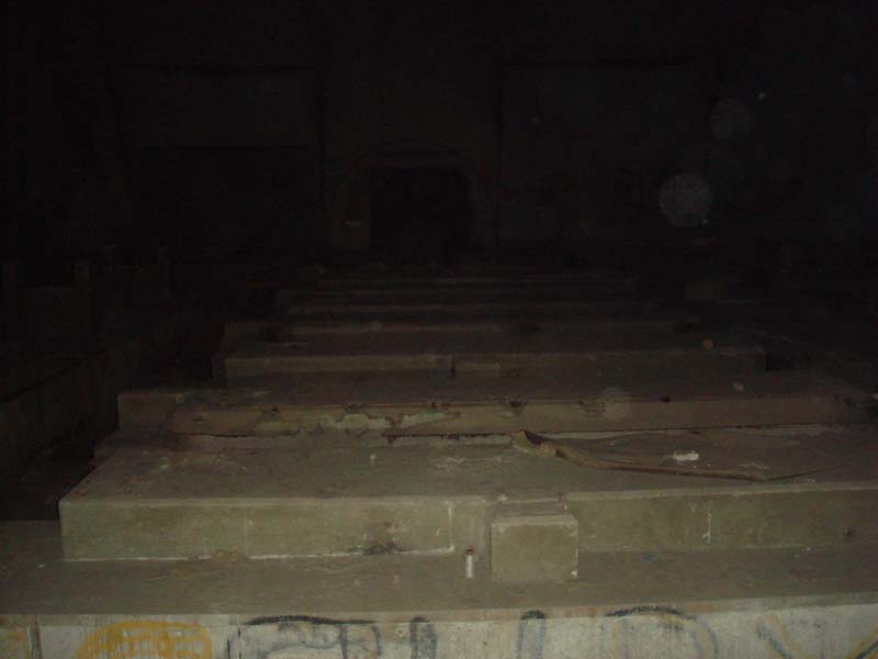Barren generator and switchgear pads with the entrance in the background.
