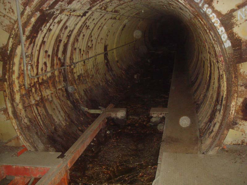 Looking down the launcher tunnel toward the fuel terminal: Somewhere up ahead lay the headwaters of mighty Titan Creek