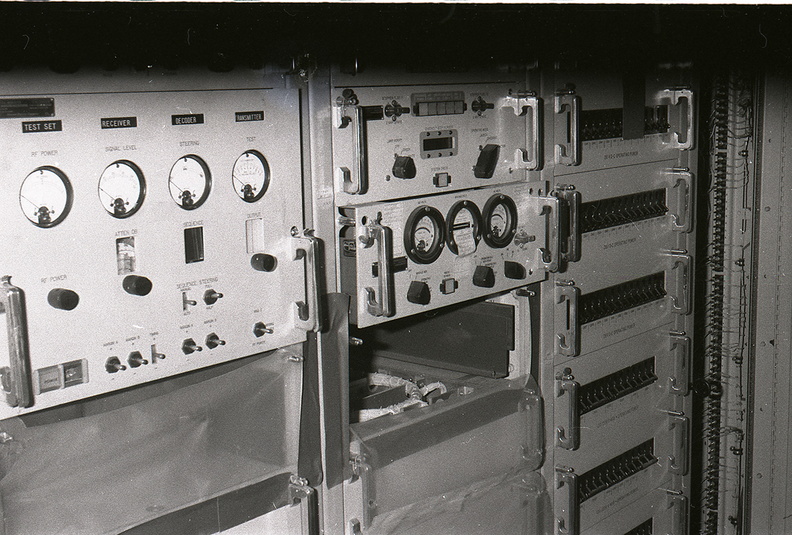 Unknown squadron, site and launcher undergoing salvage operations. Presumed to be taken in the early 1970's, this photo shows aerospace ground equipment racks with launch and checkout gear on level III of the equipment terminal. Note the empty slots in the equipment racks where gear has been removed. Please contact me at chromehooves@hotmail.com if you have any information on this photo. Any help identifying this or any other photos in the archive is greatly appreciated. Taken: Unknown-- probably late 1960's to early 1970's. Source: provided courtesy of the Titan Missile Museum/Nick Halliday (http://www.titanmissilemuseum.org/) titan_panel-2_d_raw-1.jpg