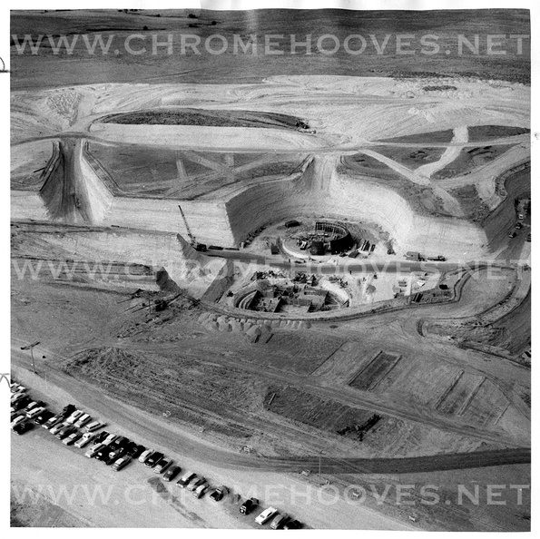 Unknown Lowry site photo by the Denver Post. Photo shows excavated construction site with power house and control center domes at center in early construction showing the 'open-cut excavation' method used for the underground complex comprising the Titan I. Photo caption reads: Aerial view shows about one-third of the Titan I complex on the Lowry Bombing Range east of Denver. The excavation shown is to a depth of about 40 feet. This is one of six complexes being constructed in the area. Taken: September 24, 1959. Source: Denver Post (liquidated archives) lowry_contstruction001-1.jpg