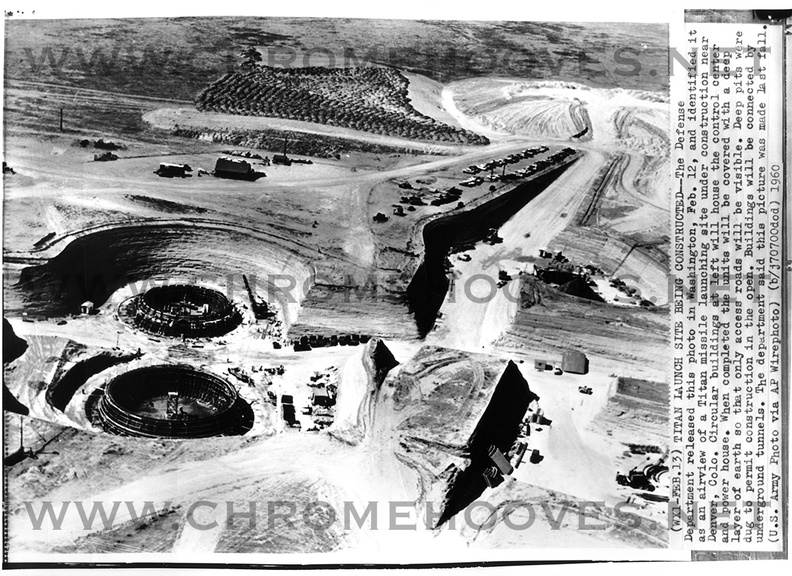 Unknown Lowry site photo by the Denver Post. Photo shows excavated construction site with power house and control center domes at center in early construction showing the 'open-cut excavation' method used for the underground complex comprising the Titan I. Taken: February 15, 1960. Source: Denver Post (liquidated archives) lowry_contstruction002-1.jpg