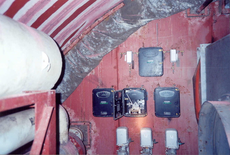Launcher Air Filtration Facility at Lowry 724-C showing indicators and controls for the pneumatic portion of the air filtration facility. These boxes would monitor and maintain pressure and humidity in the air system. Radiation levels were also monitored in this area. Taken: Circa 2002 Source: Myself filtration-10-lafa.jpg